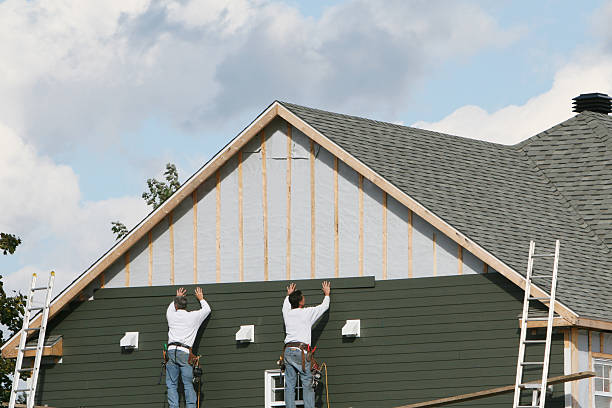 Professional Siding Contractor technician working in Bethpage, NY